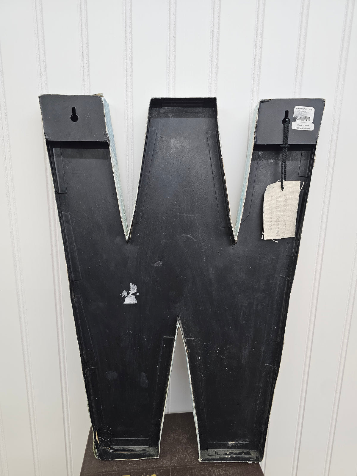 Metal and canvas W wall art, 17" x 13"