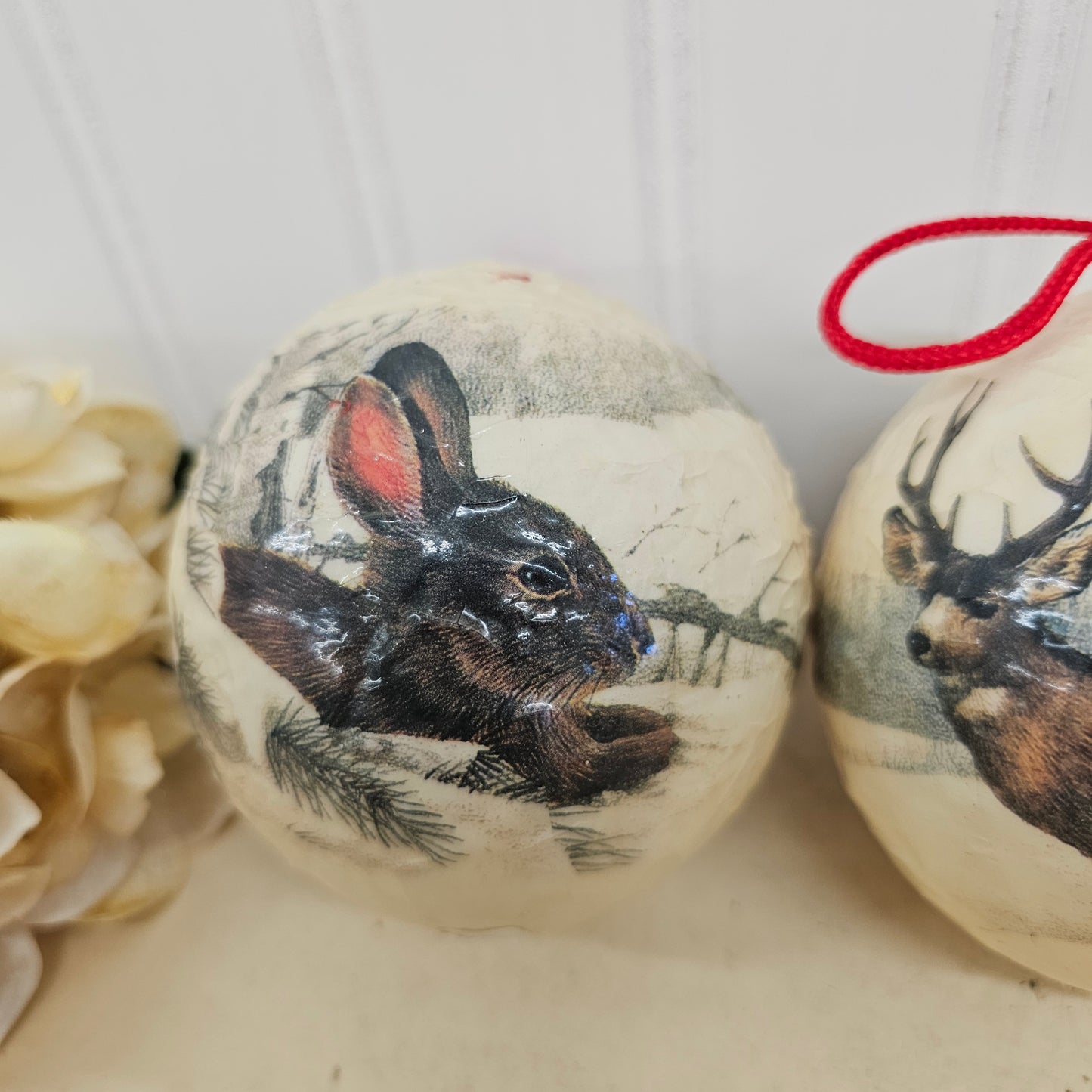 Set of 4 paper mache wild lift ornaments
