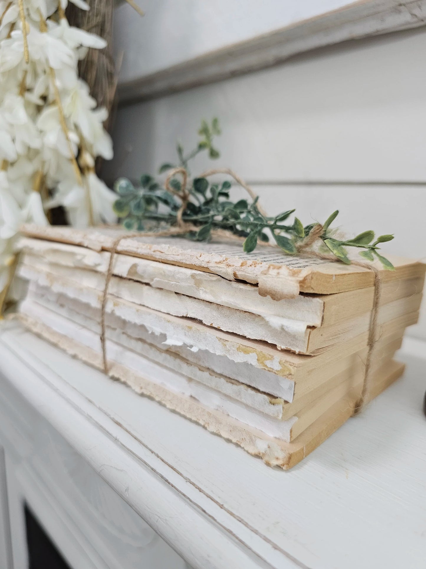 stack of textured paper pack books