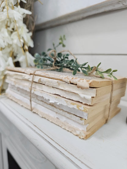 stack of textured paper pack books