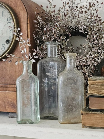 set of 3 vintage glass bottles