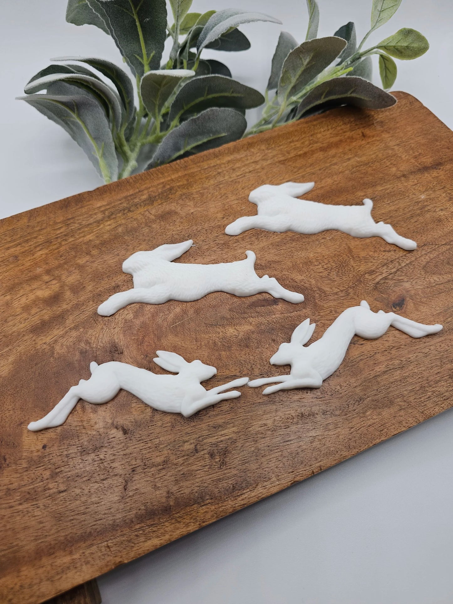 set of 4 resin rabbits