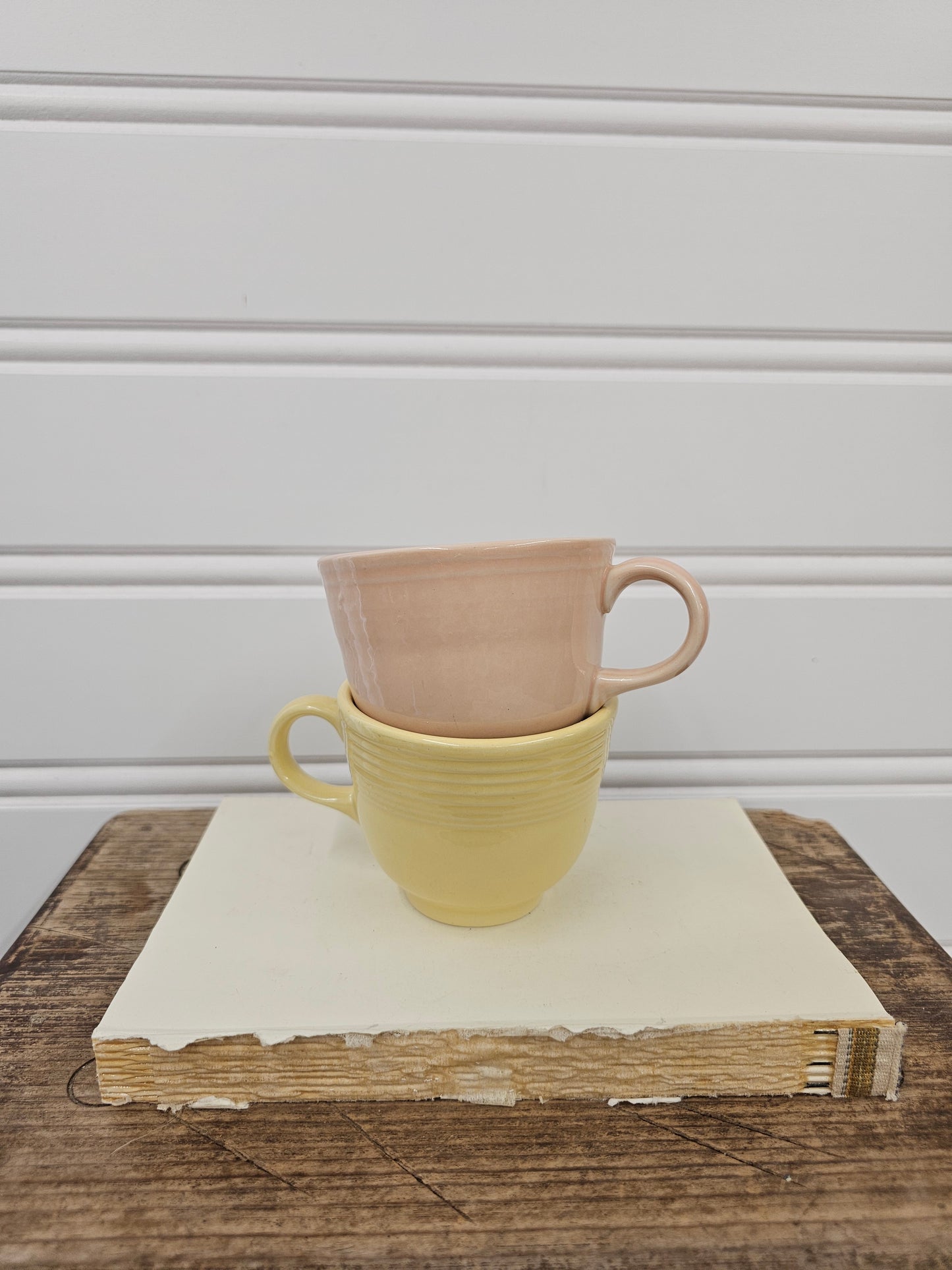 set of 2 yellow and pink vintage cups