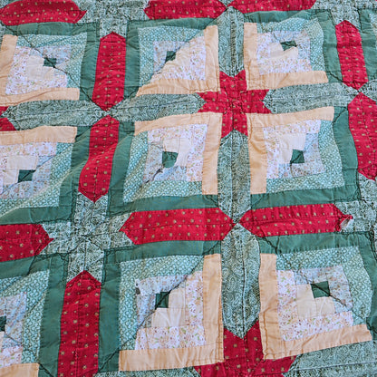 Christmas colored quilt approx 88" x 76", as is