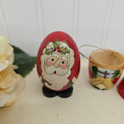 Two wooden painted santas