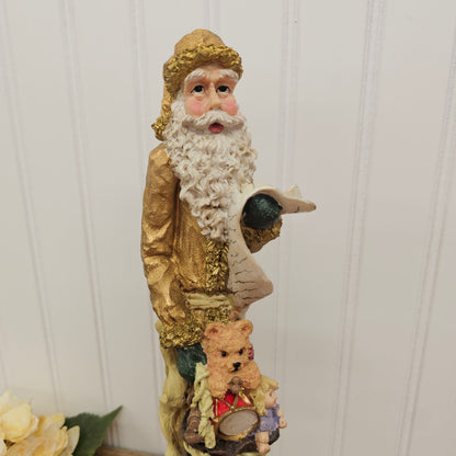 tall Gold Santa figurine