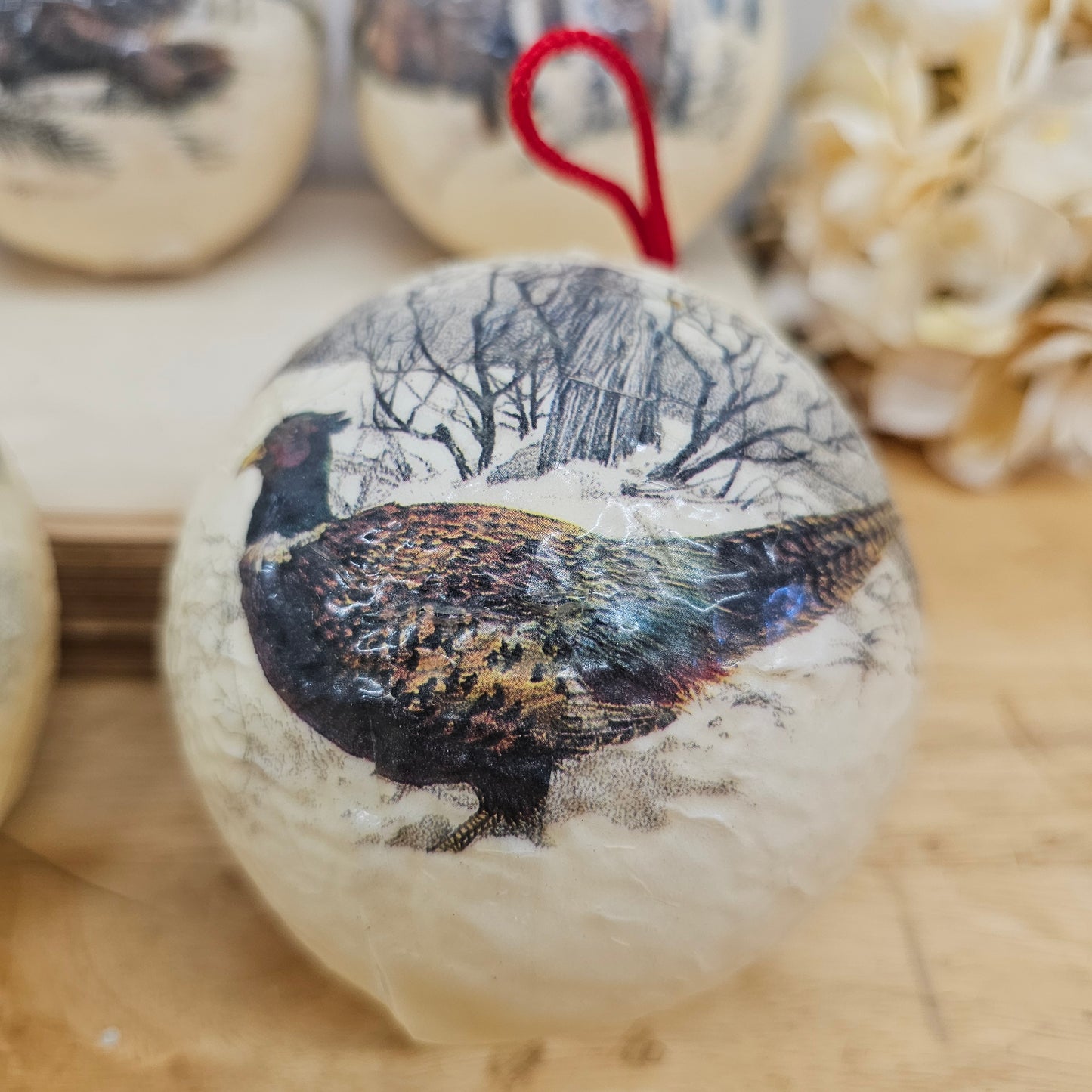 Set of 4 paper mache wild lift ornaments