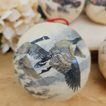 Set of 4 paper mache wild lift ornaments