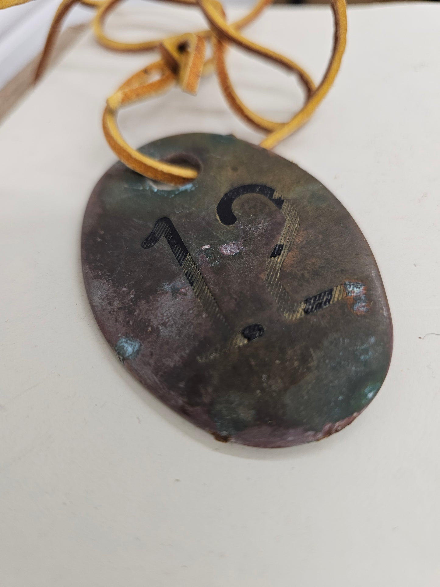 vintage copper #12 tag