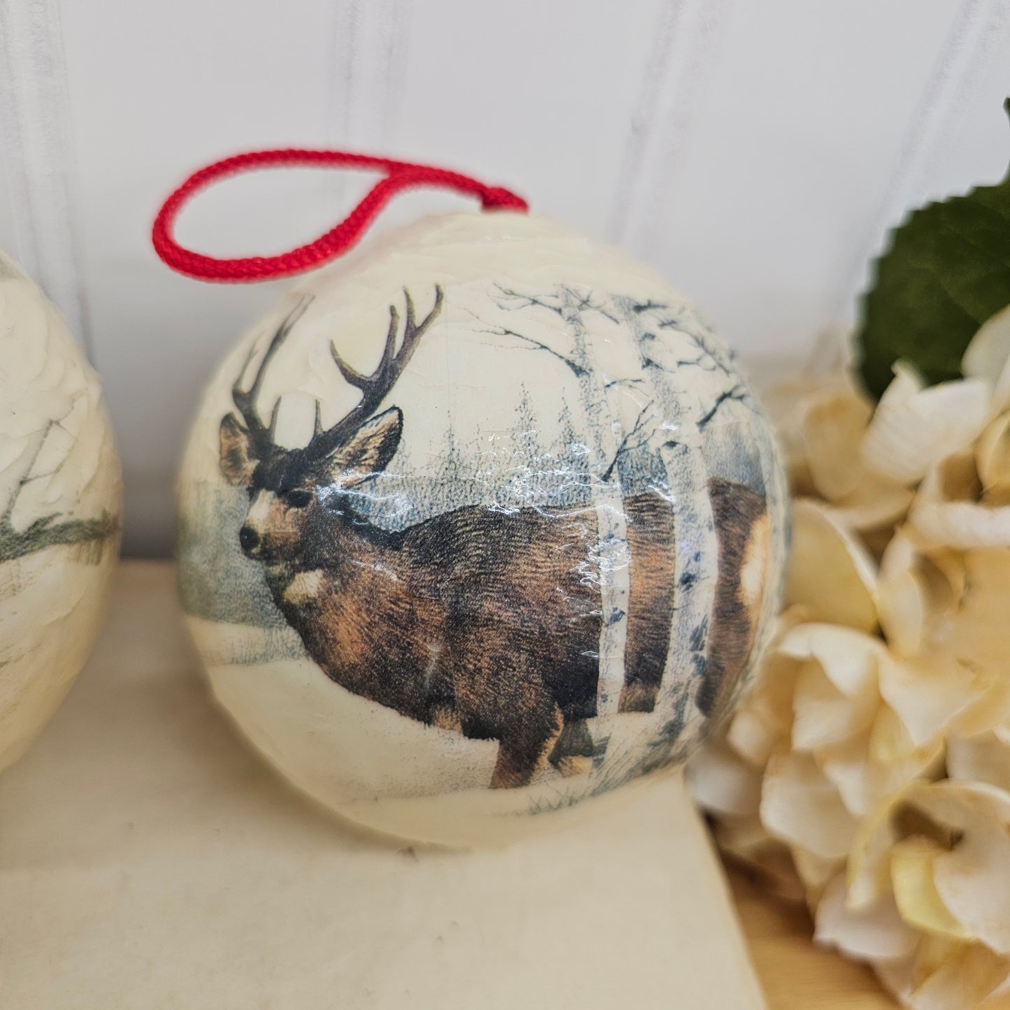 Set of 4 paper mache wild lift ornaments