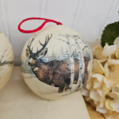 Set of 4 paper mache wild lift ornaments