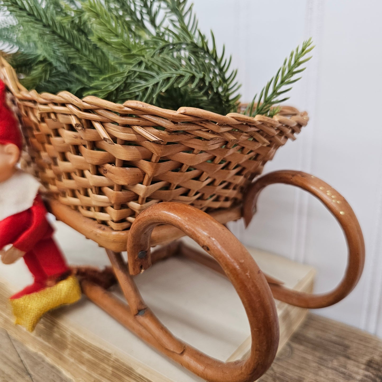 basket Sleigh with greenery and adorable vintage Christmas pixie elf
