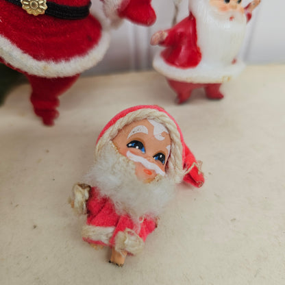 Set of 3 vintage dancing Santa figurines