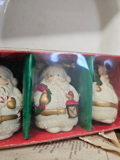 Set of 4 porcelain Santa ornaments