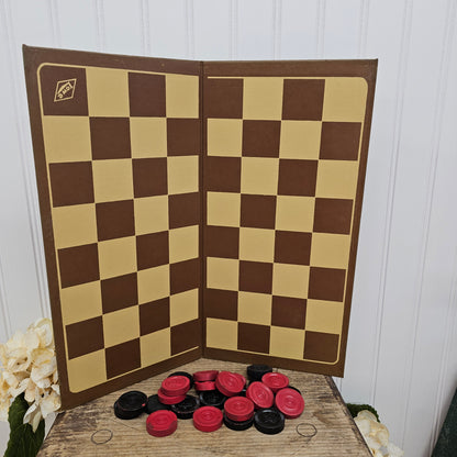 Lowe brown/ beige checkerboard with pieces, as is