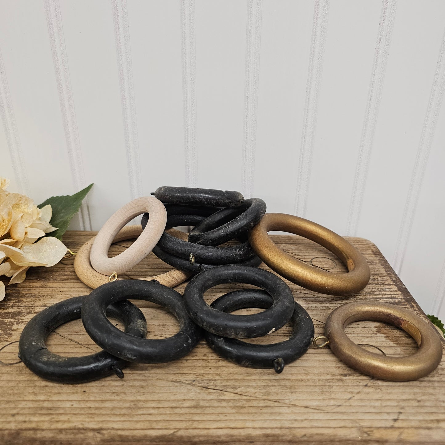 Set of 12 wooden rings - black,gold, and wooden