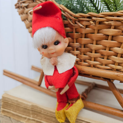 basket Sleigh with greenery and adorable vintage Christmas pixie elf