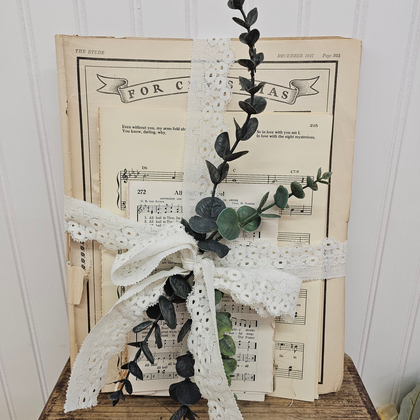 3 lbs Music sheet bundle tied together with lace and greenery