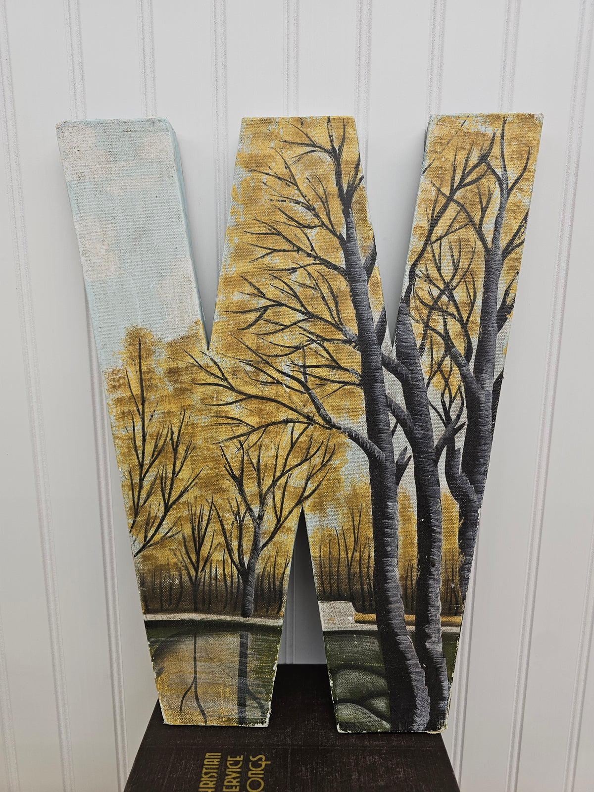 Metal and canvas W wall art, 17" x 13"