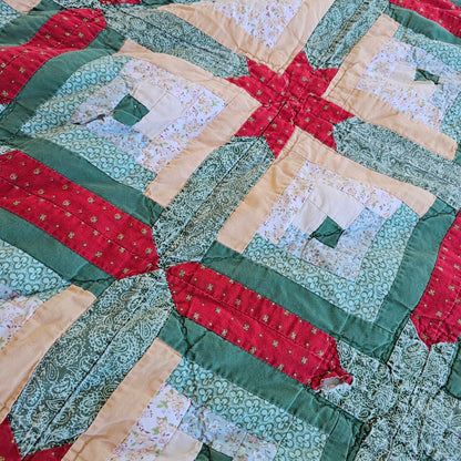 Christmas colored quilt approx 88" x 76", as is