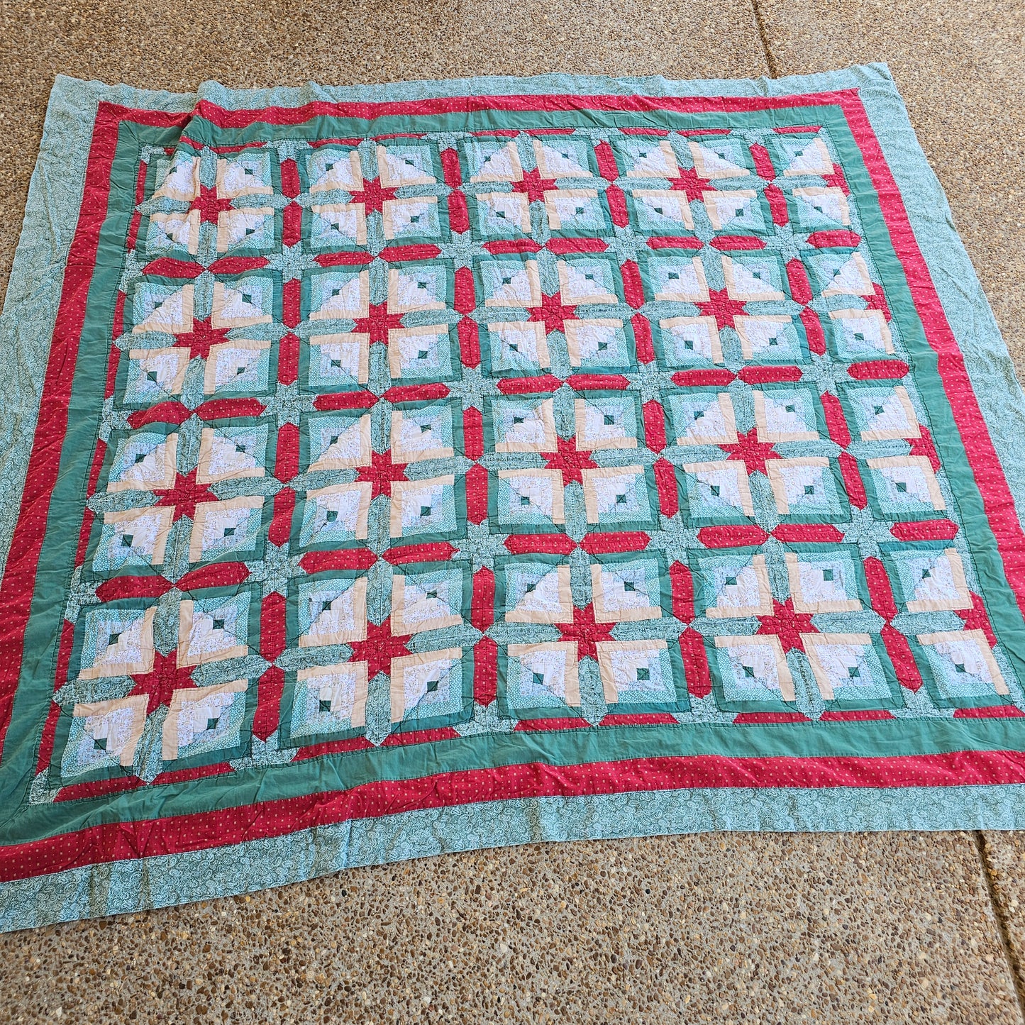 Christmas colored quilt approx 88" x 76", as is