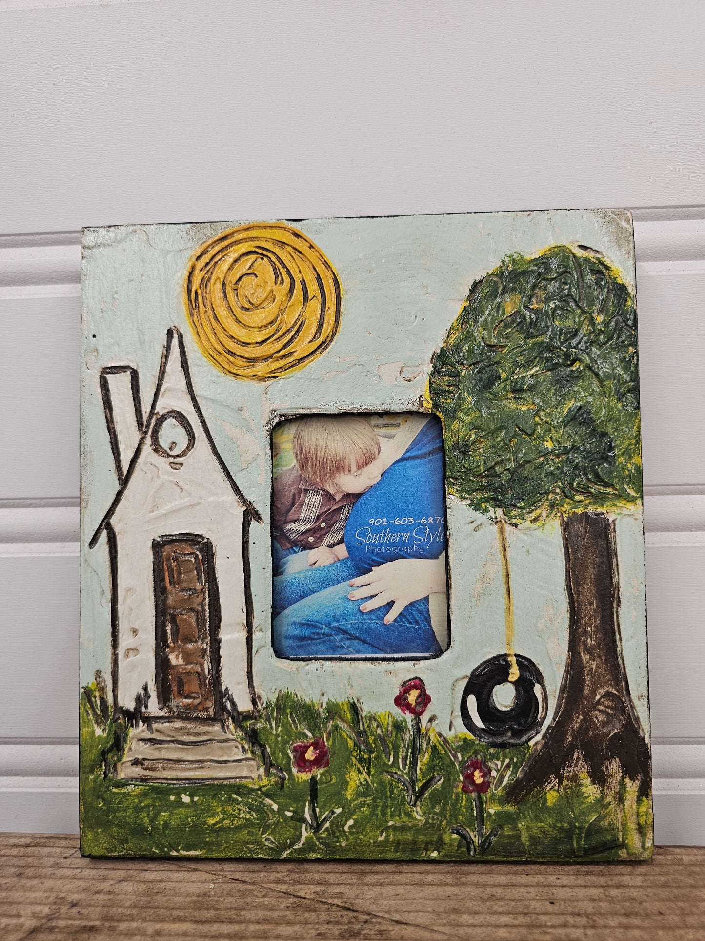 7 1/2" x 8 1/2" picture frame. Holds 3x4 picture