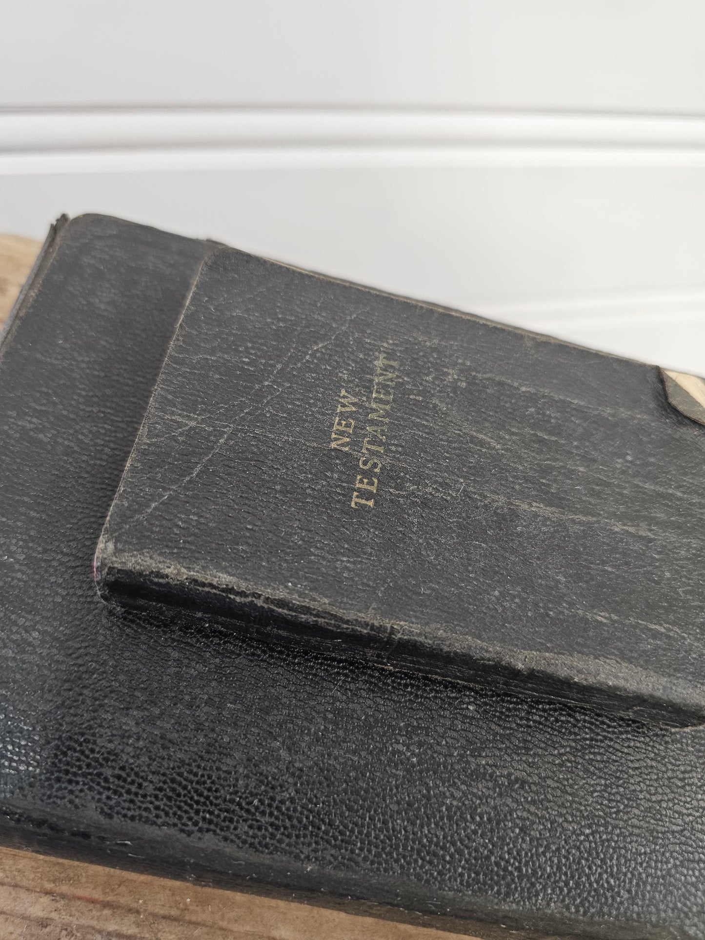 set of 2 vintage bibles - black leather with red pages