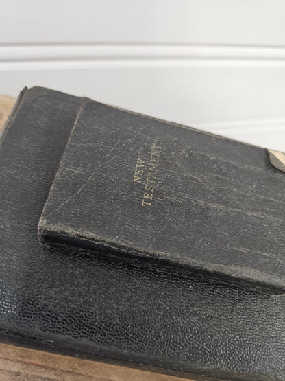 set of 2 vintage bibles - black leather with red pages