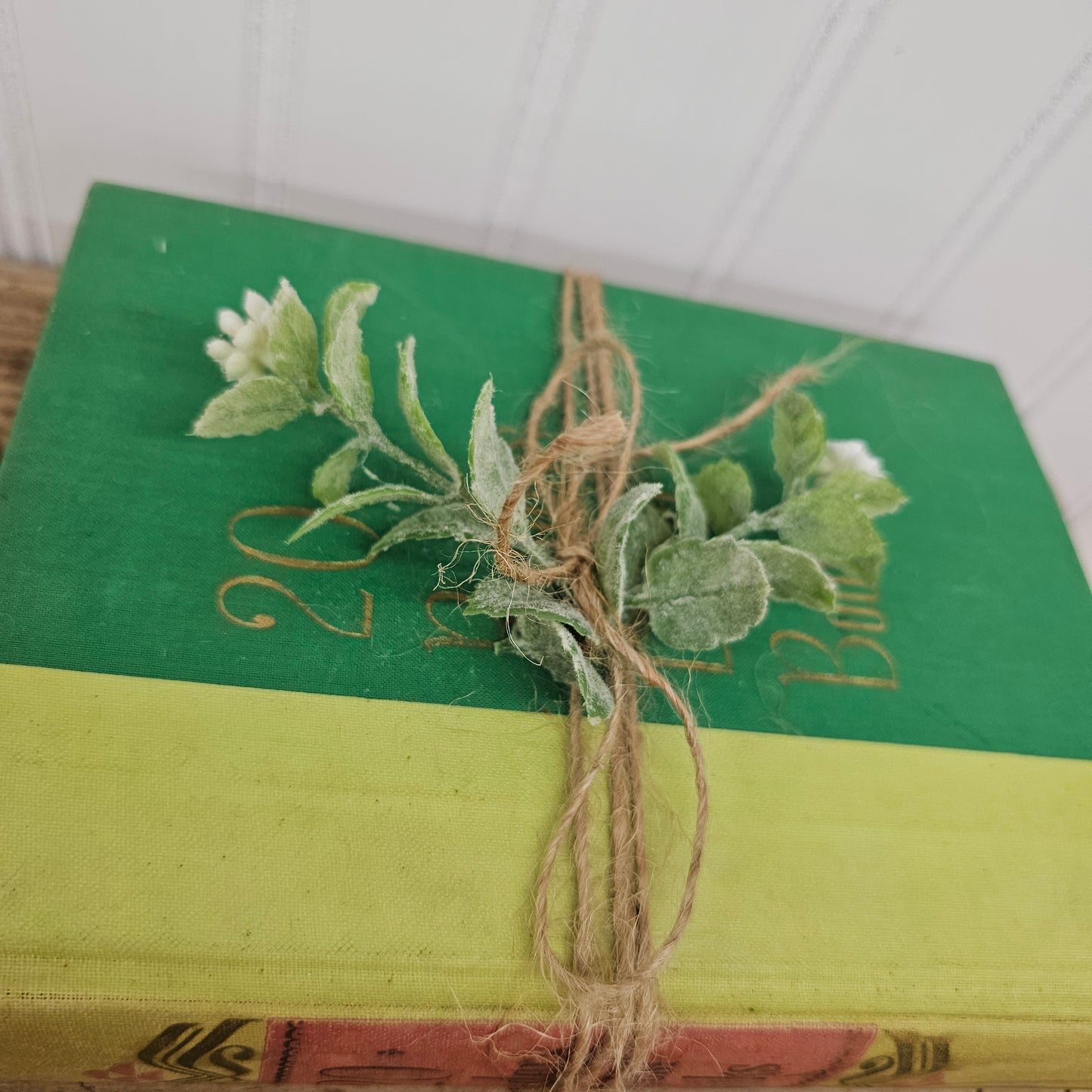 Green readers digest book with twine