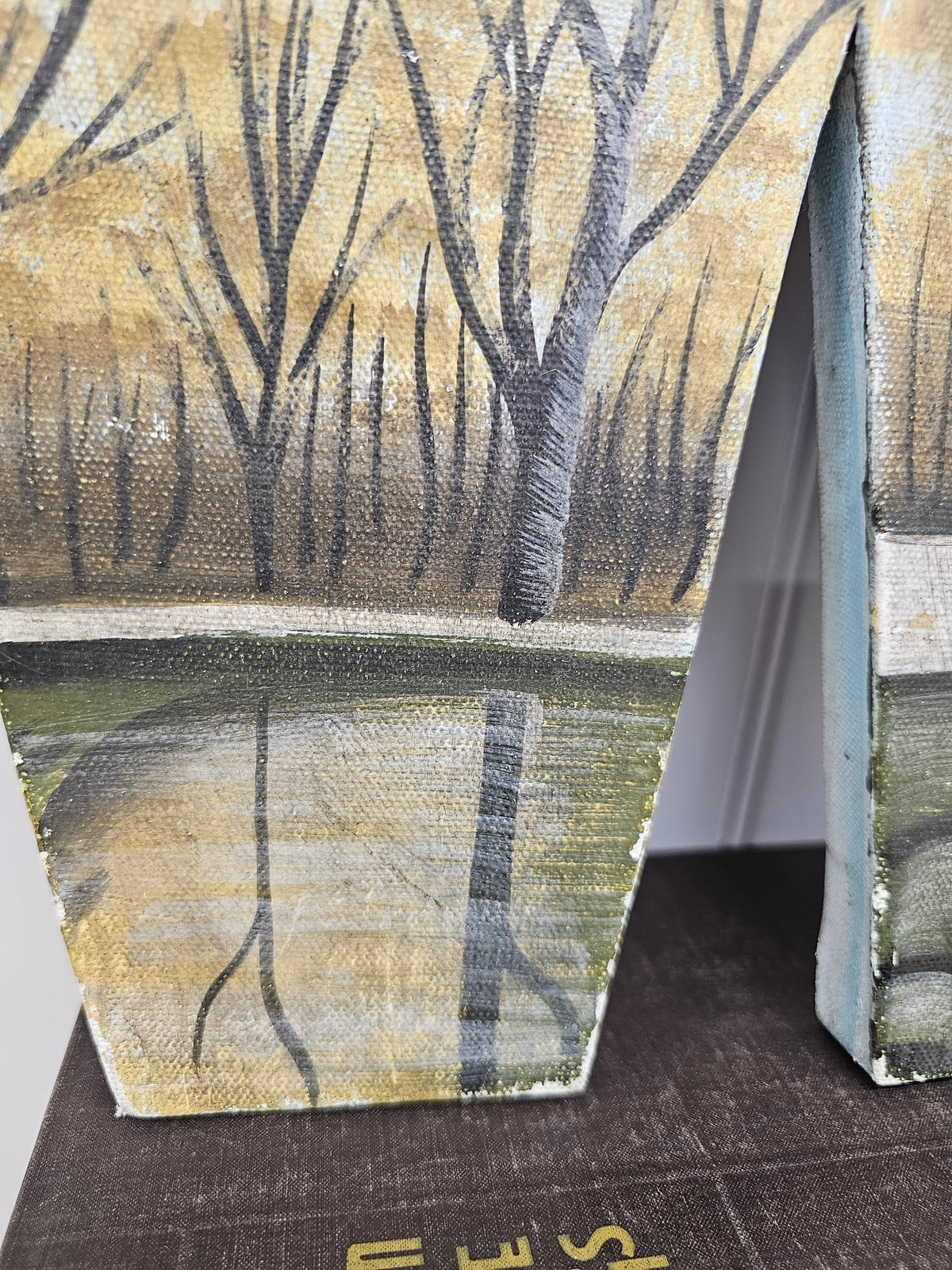 Metal and canvas W wall art, 17" x 13"