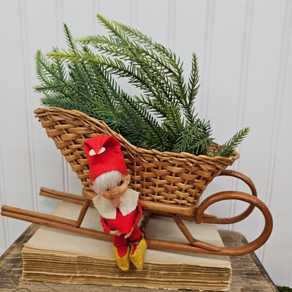 basket Sleigh with greenery and adorable vintage Christmas pixie elf