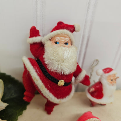 Set of 3 vintage dancing Santa figurines