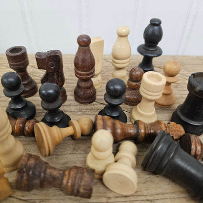 25 vintage wooden chess pieces