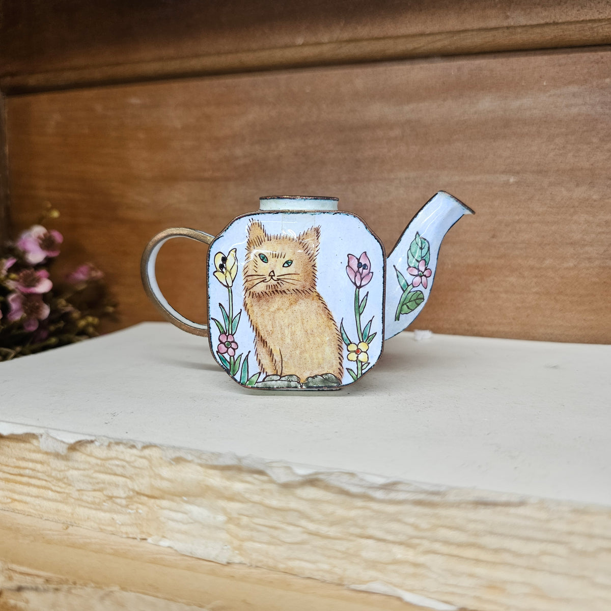 Miniature hand painted metal teapot