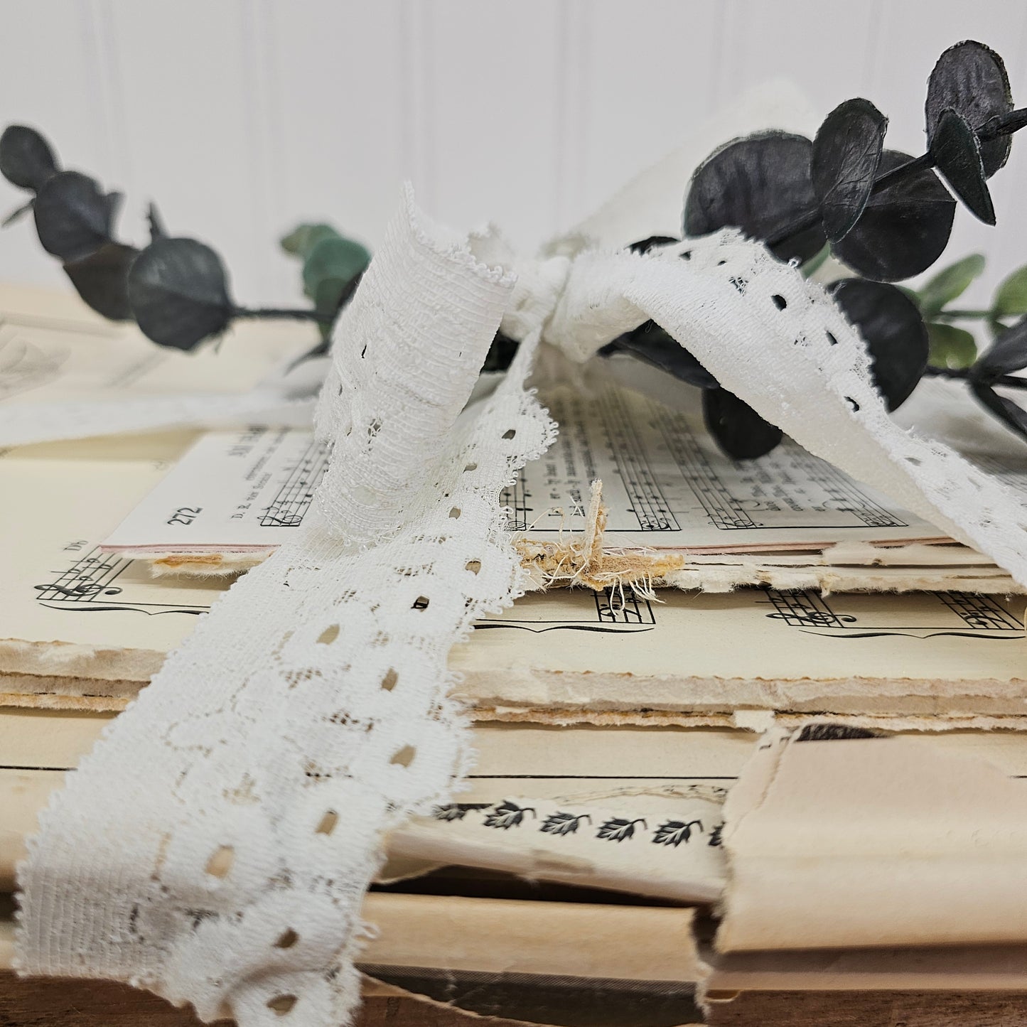 3 lbs Music sheet bundle tied together with lace and greenery