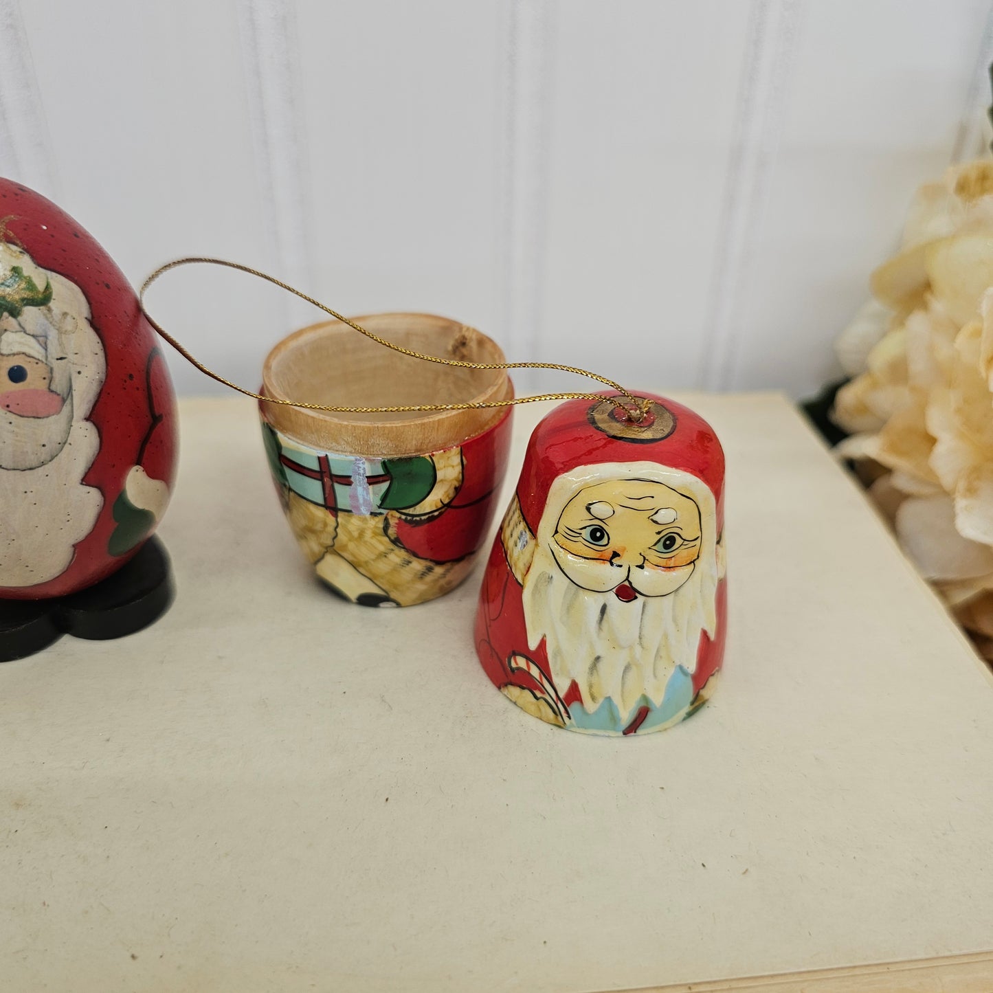 Two wooden painted santas