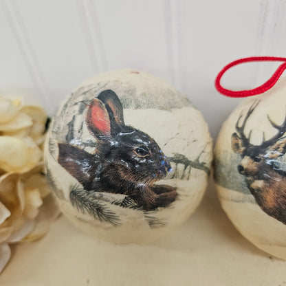 Set of 4 paper mache wild lift ornaments