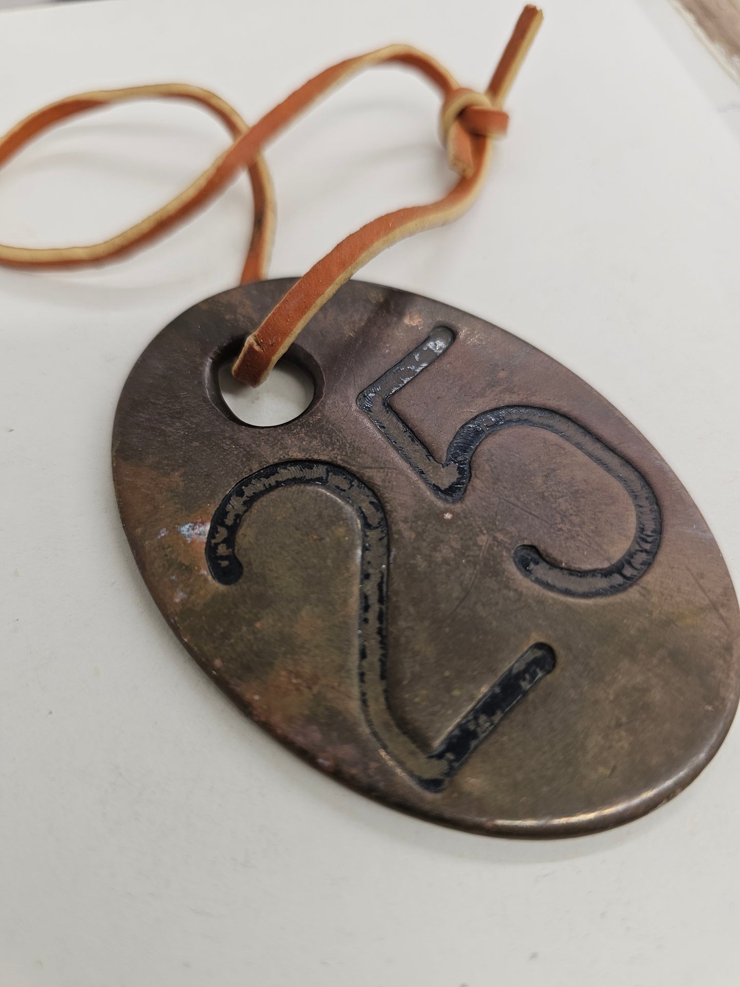 vintage copper #55 tag