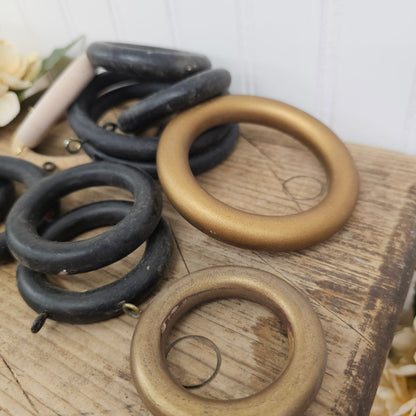 Set of 12 wooden rings - black,gold, and wooden