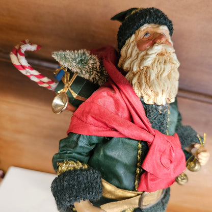 vintage paper mache Santa with Green suit and sack of toys 1987
