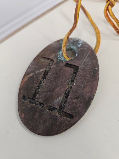 vintage copper #11 tag