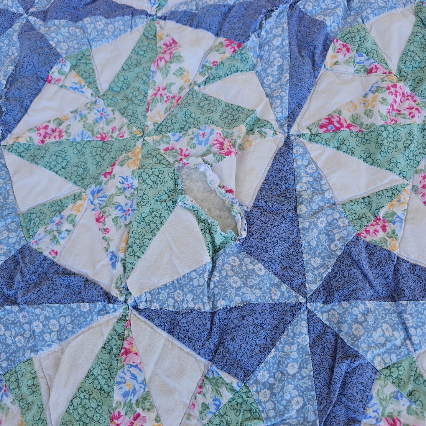 Blue floral quilt, approx 79" x 71", as is