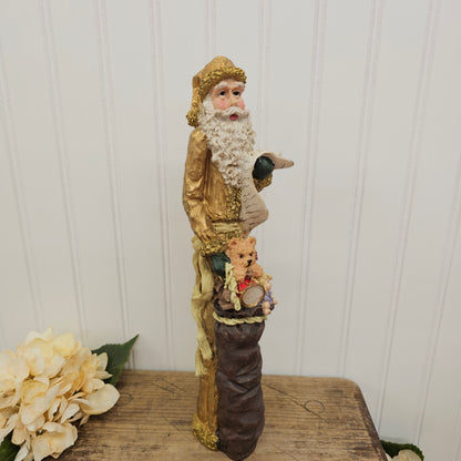 tall Gold Santa figurine
