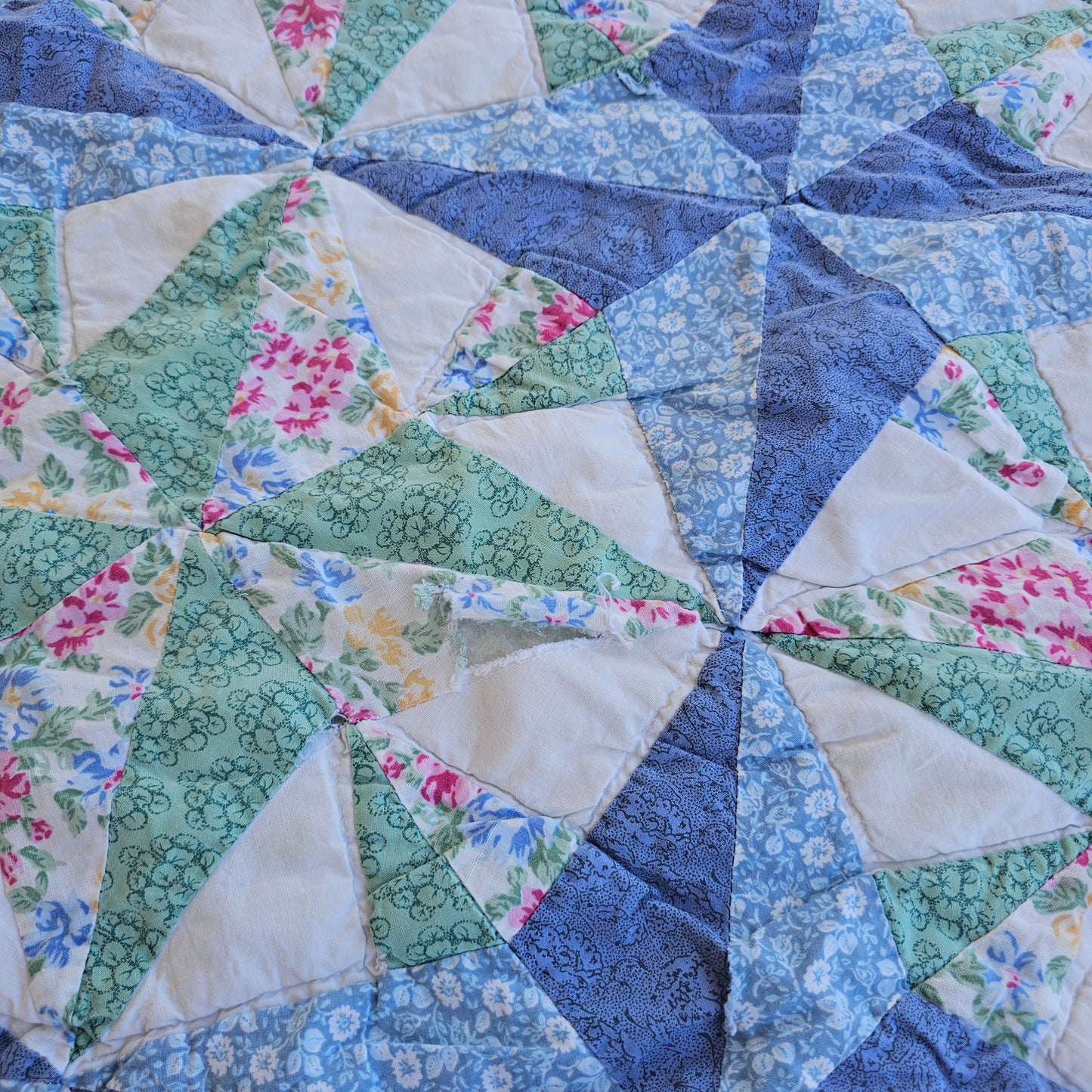 Blue floral quilt, approx 79" x 71", as is