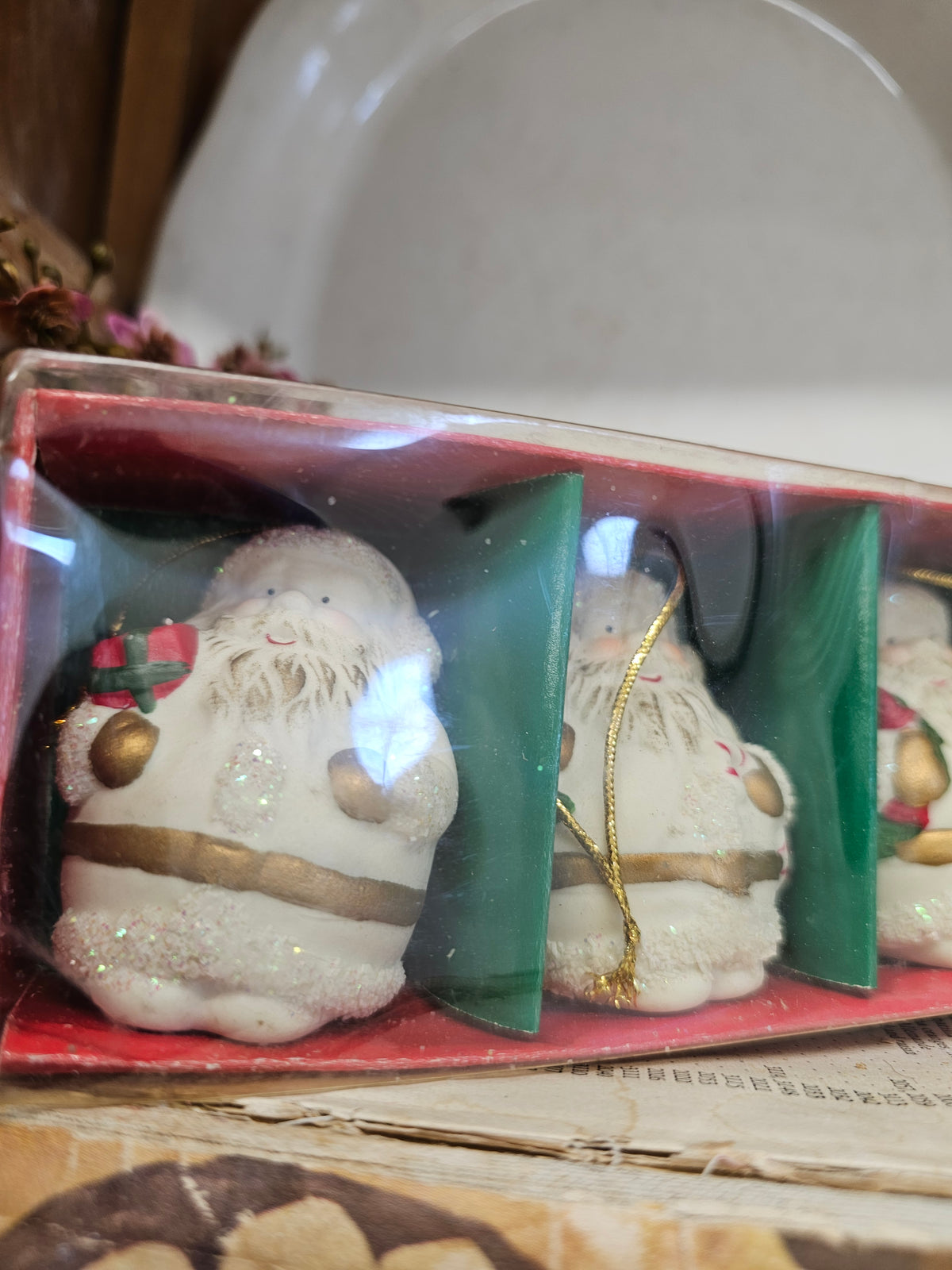 Set of 4 porcelain Santa ornaments