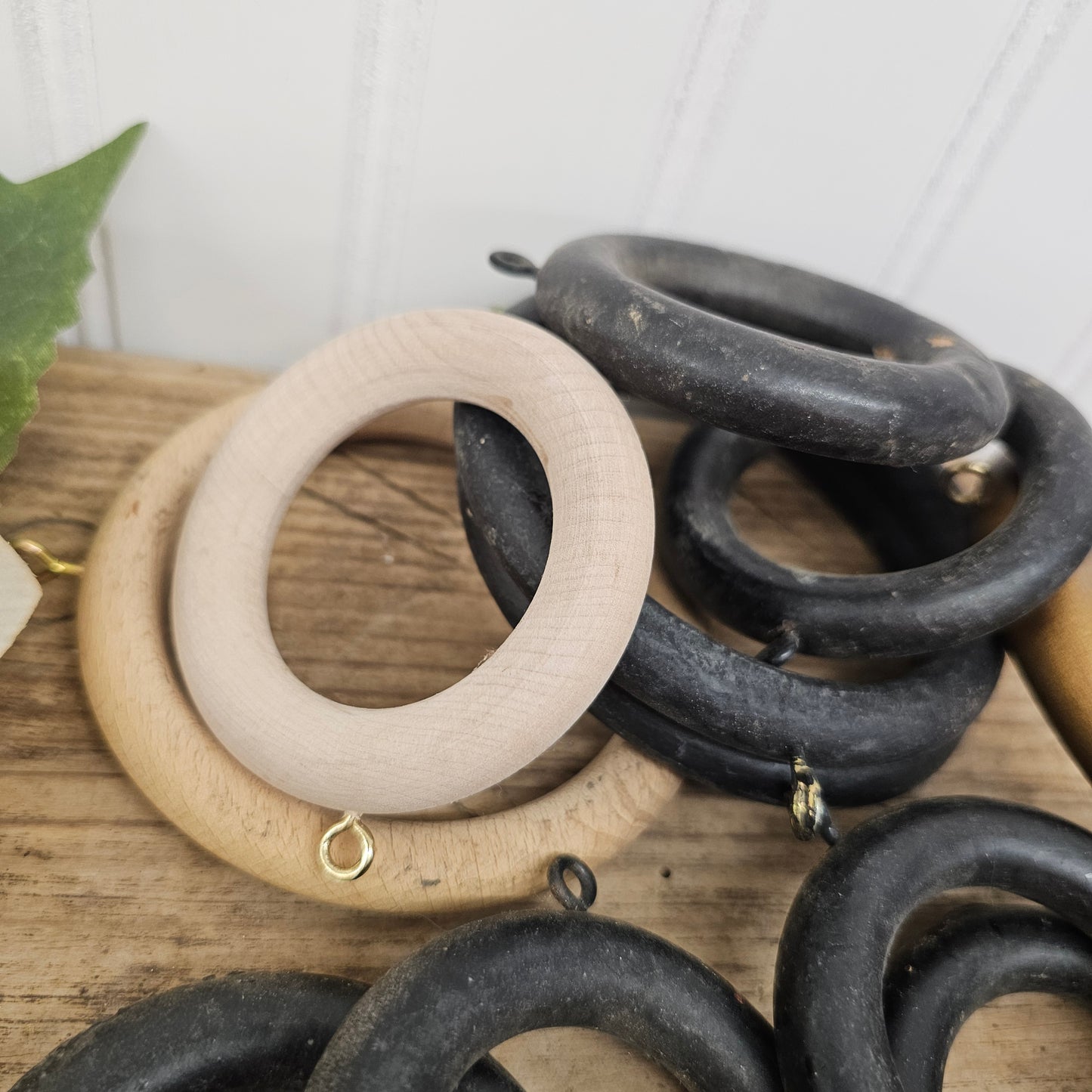 Set of 12 wooden rings - black,gold, and wooden